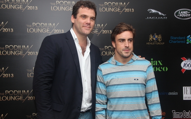 Robbie with Fernando Alonso... because that's his job. 