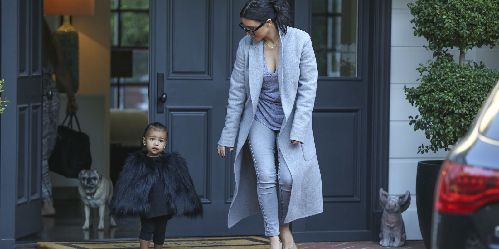 nrm_1417266412-kim_kardashian_dresses_north_west_in_a_cape