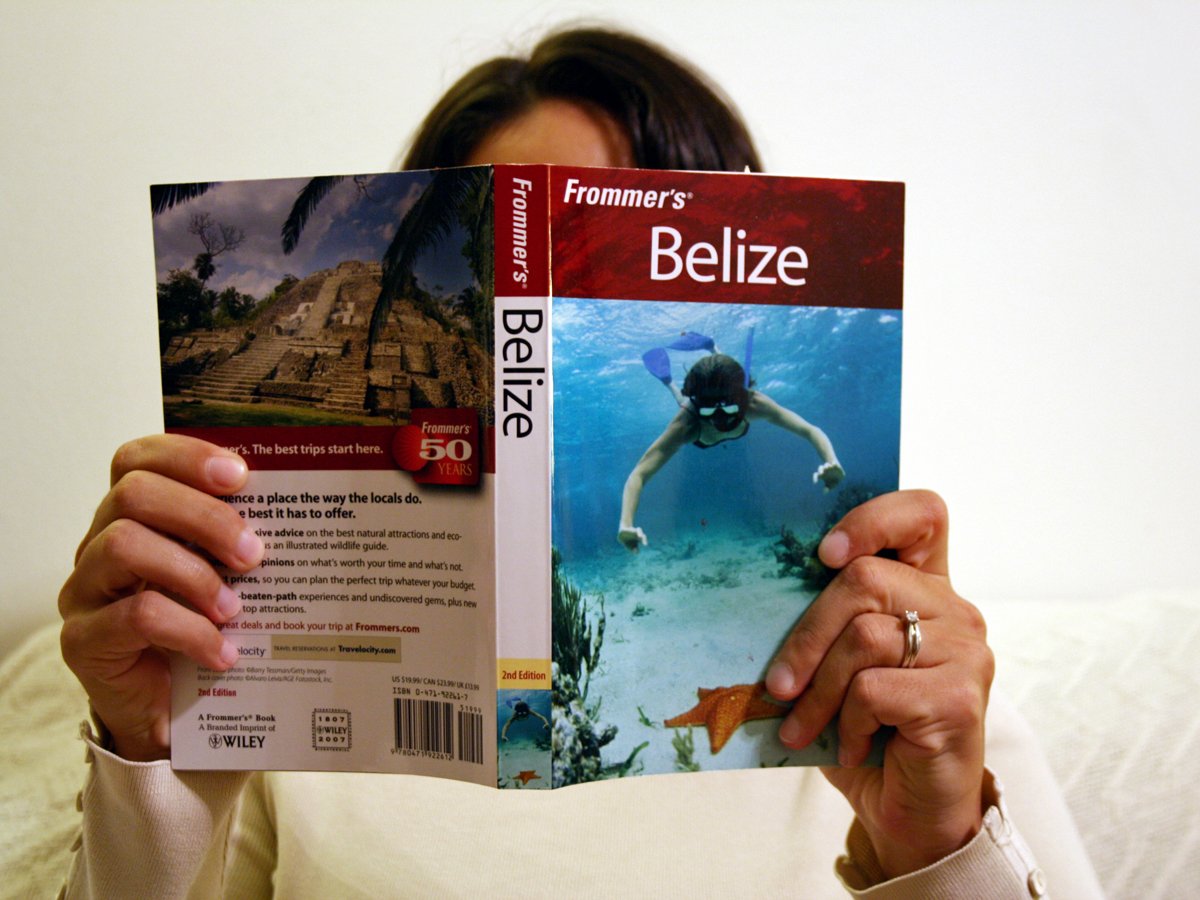 woman-reading-travel-guide