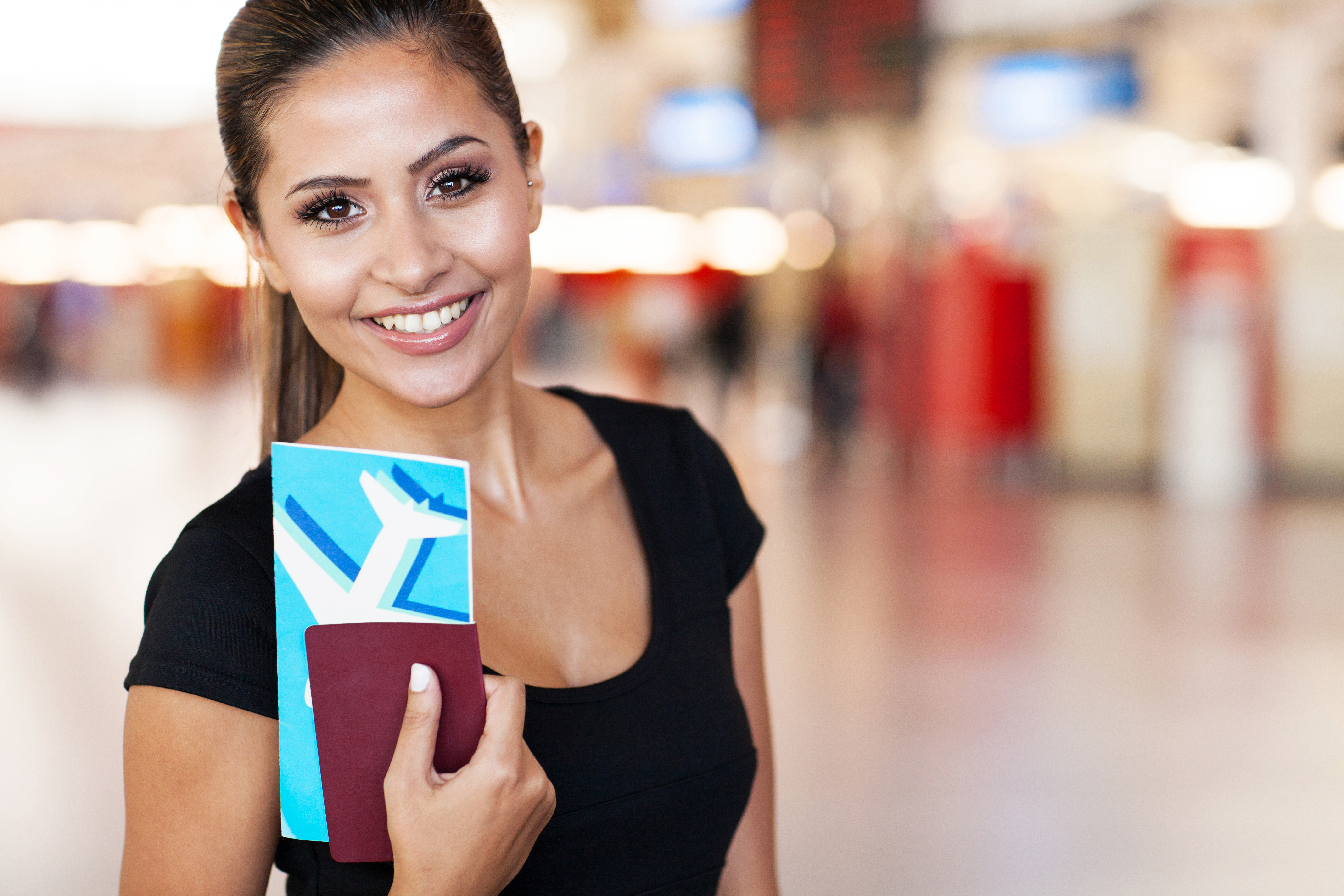 portrait of young businesswoman at airport